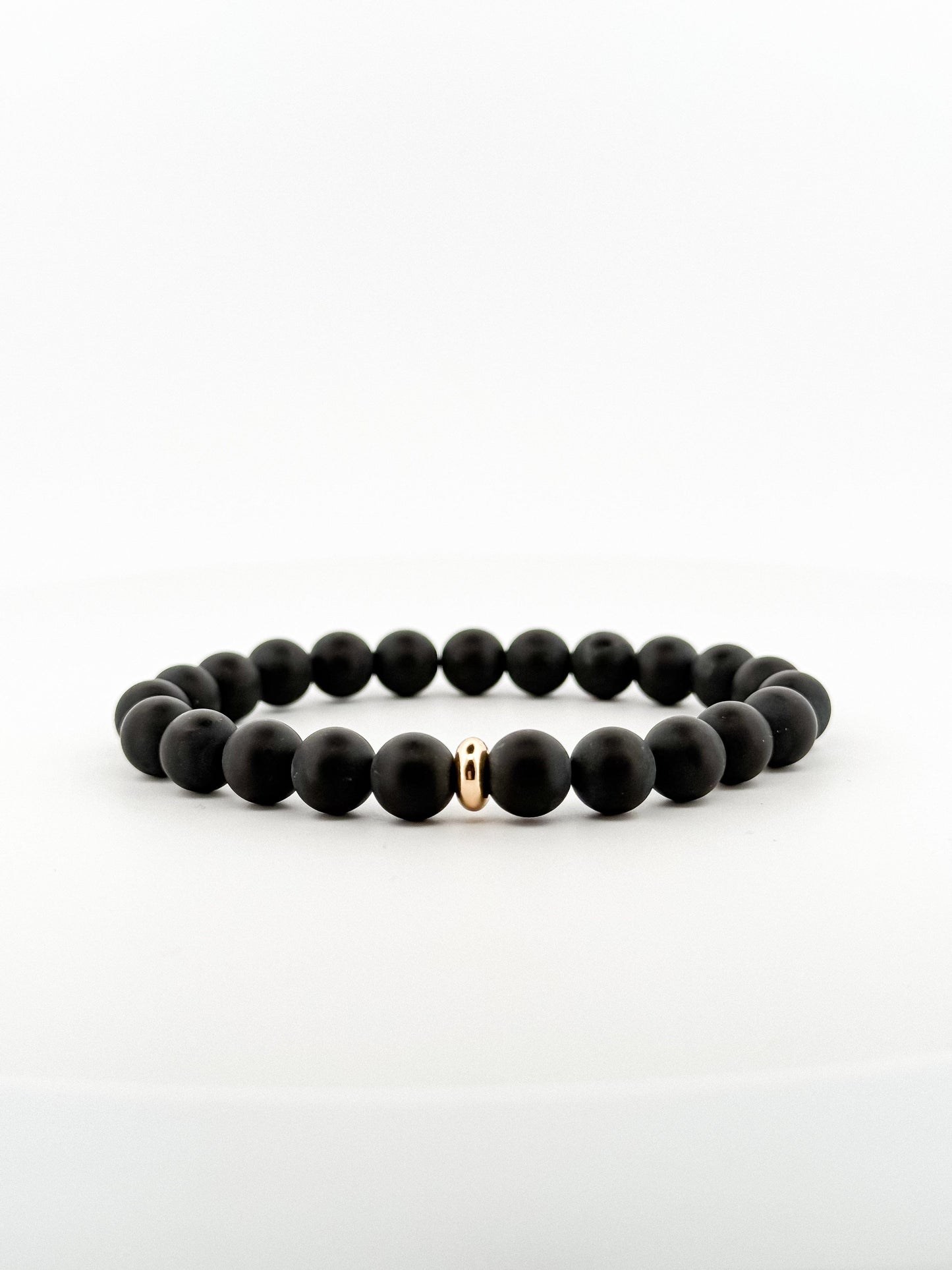 Black Onyx Gold Disk Bracelet 8mm