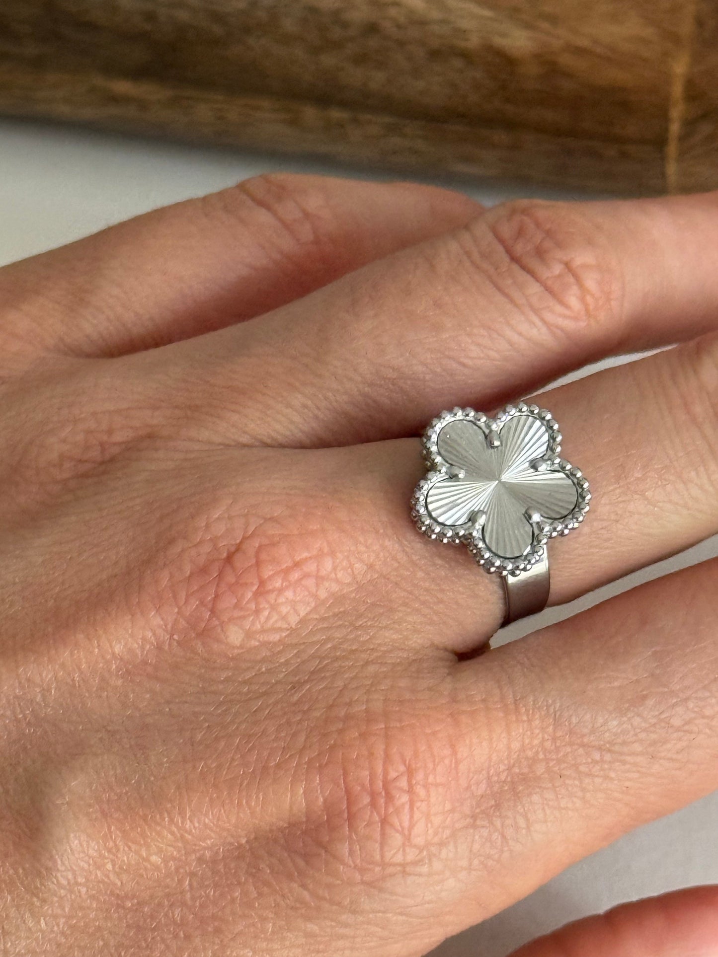 Silver textured flower ring