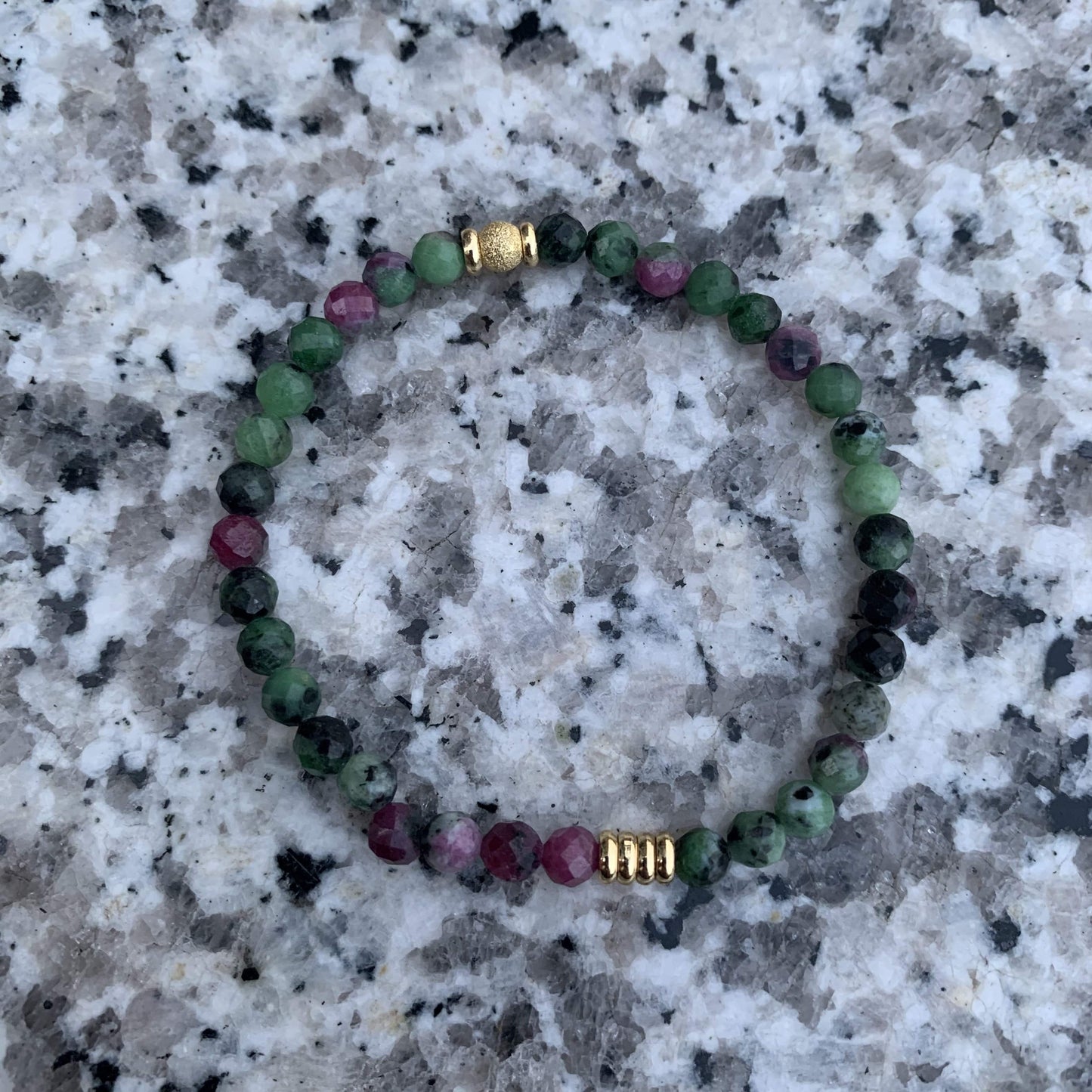 Ruby-zoisite bracelet with gold disks