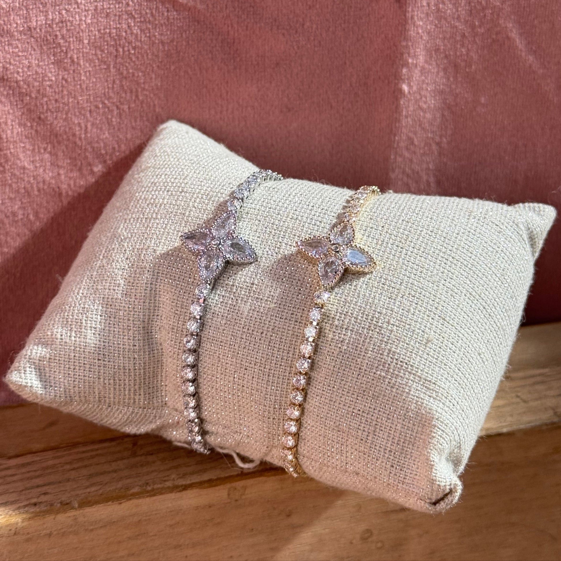 Two beautiful flower bracelets in silver and gold color