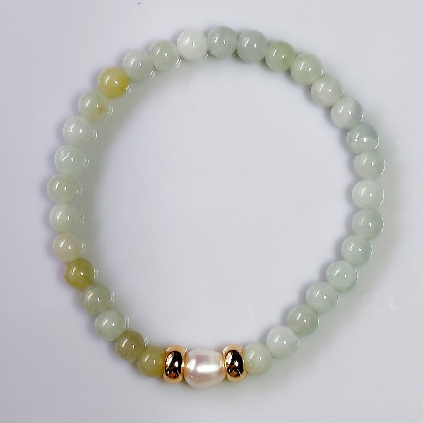 Jade bracelet with a natural fresh water pearl