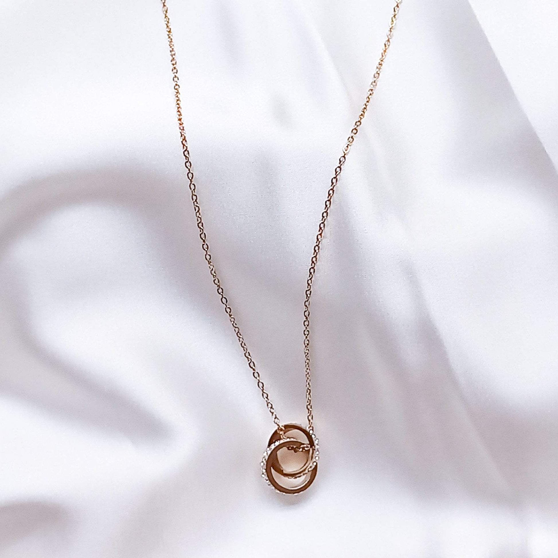 Gold Duo Disks necklace