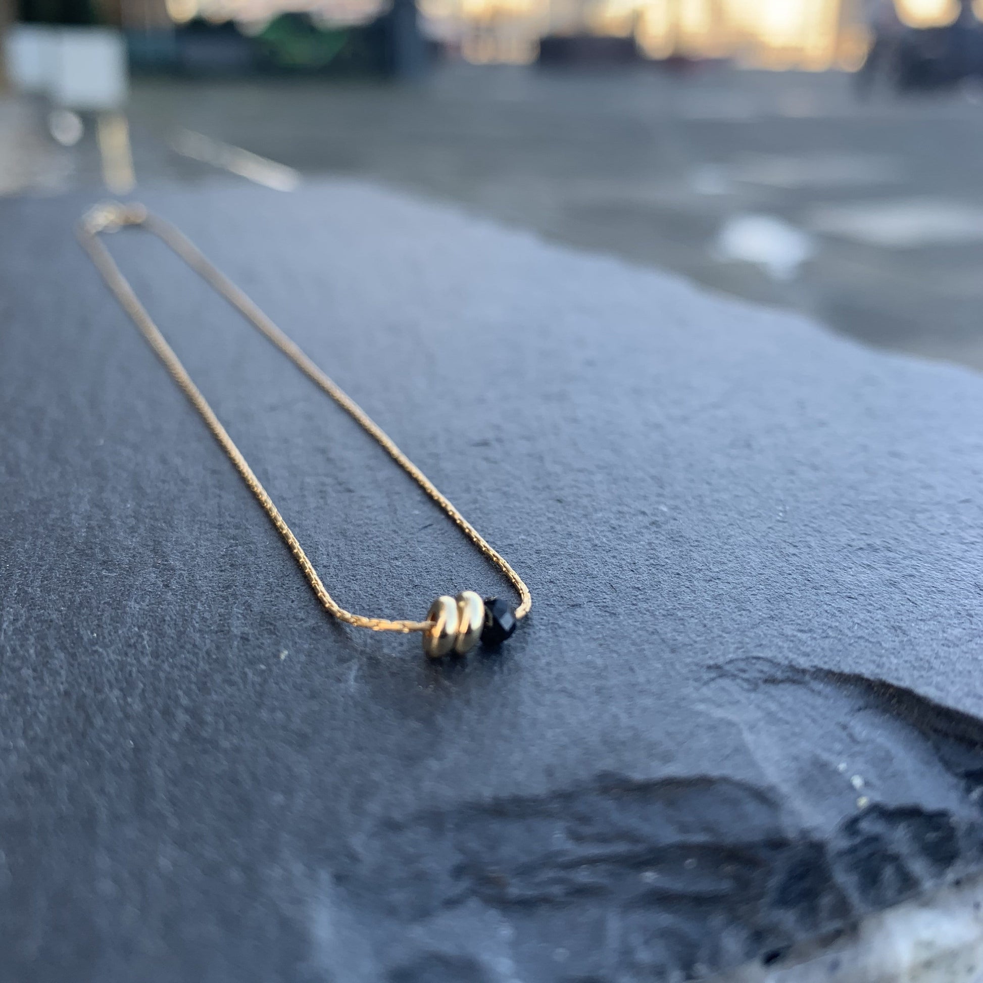 Black Spinel necklace with gold Duo Disks