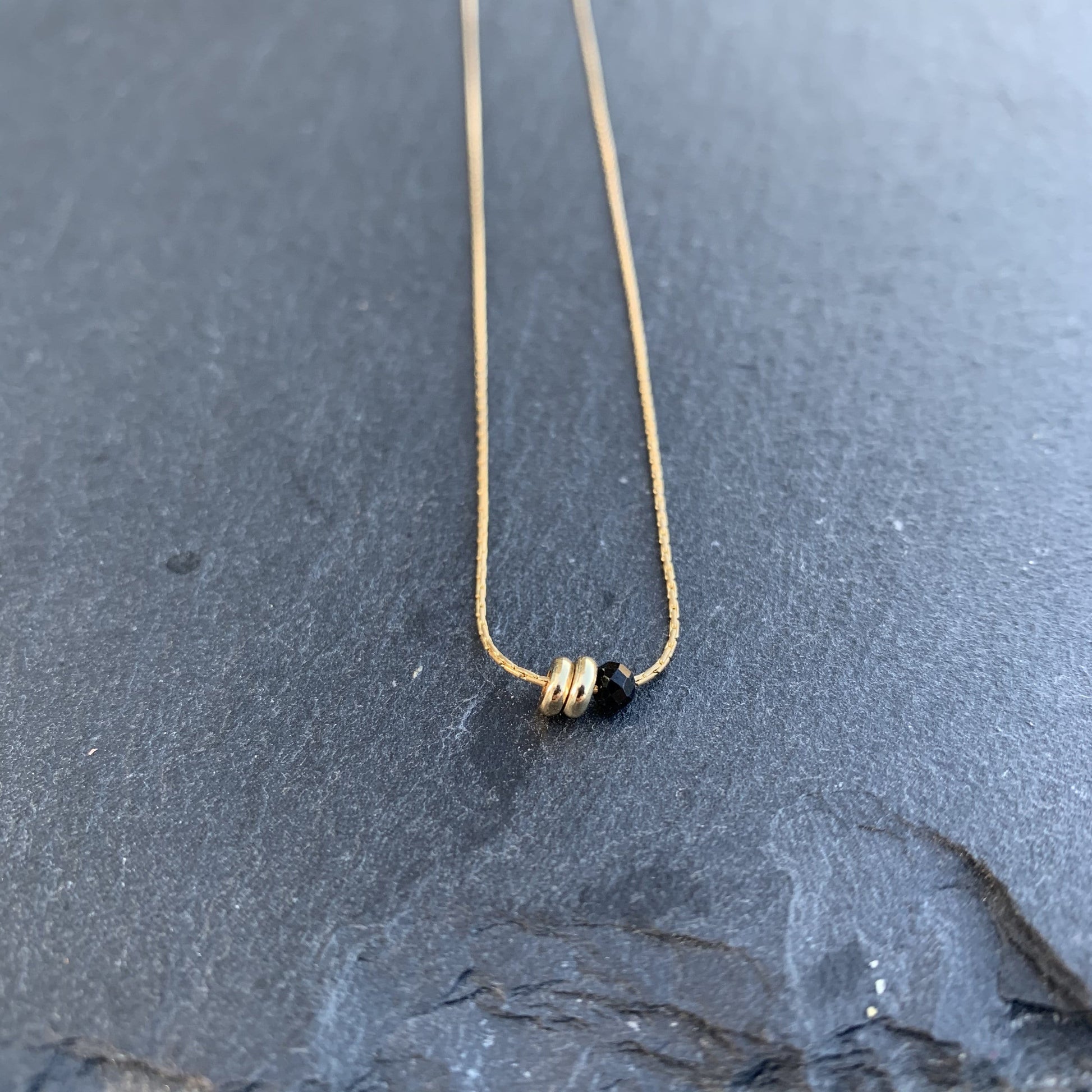 Black Spinel necklace with gold Duo Disks