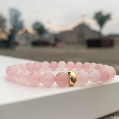 Rose quartz bracelet and gold disk plated 