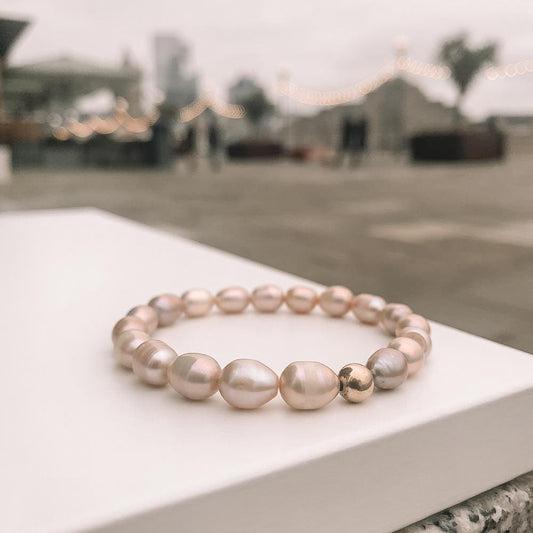 Pink Pearl bracelet with 9k Gold