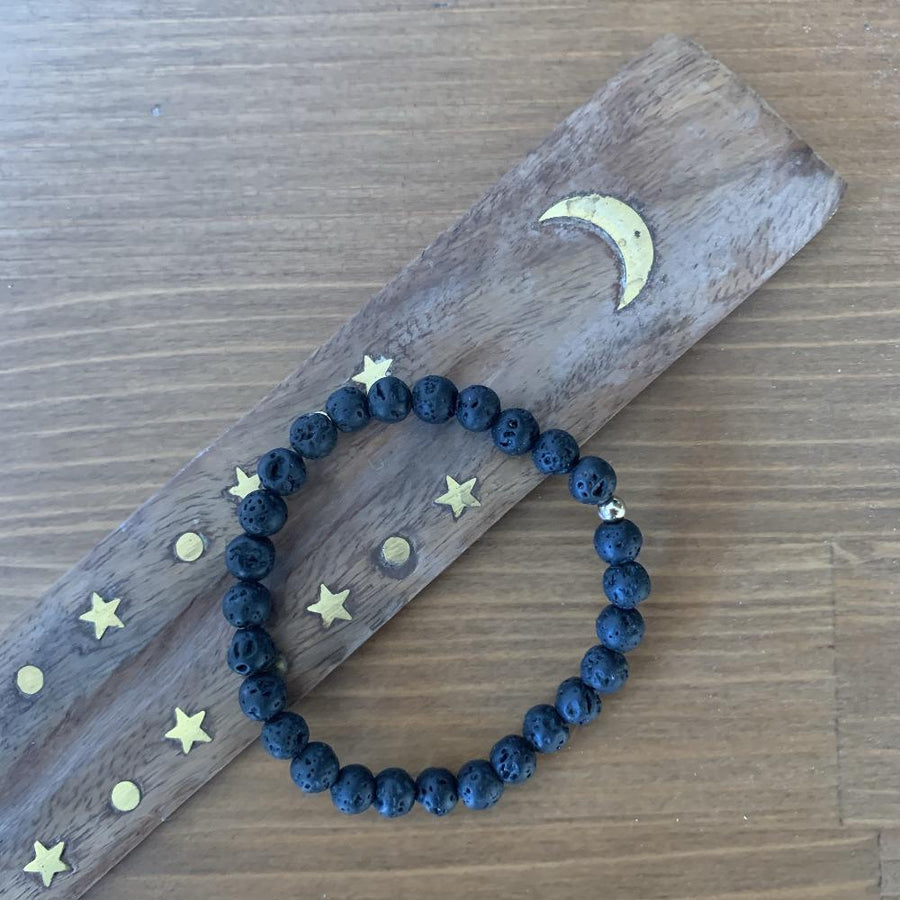 Lava stone bracelet, 9k gold