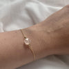 Rose quartz bracelet on gold chain