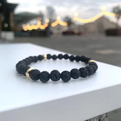 Lava stone bracelet gold disks