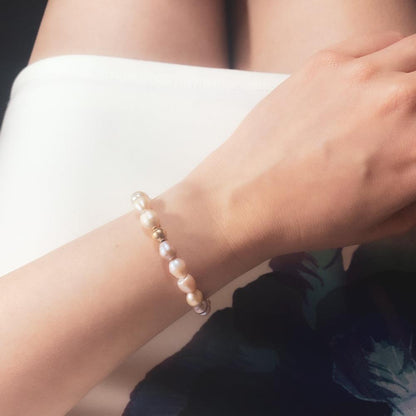 Pink Pearl bracelet with 9k Gold