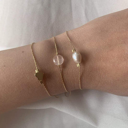 Rose quartz bracelet on gold chain
