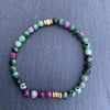 Ruby-zoisite bracelet with gold disks